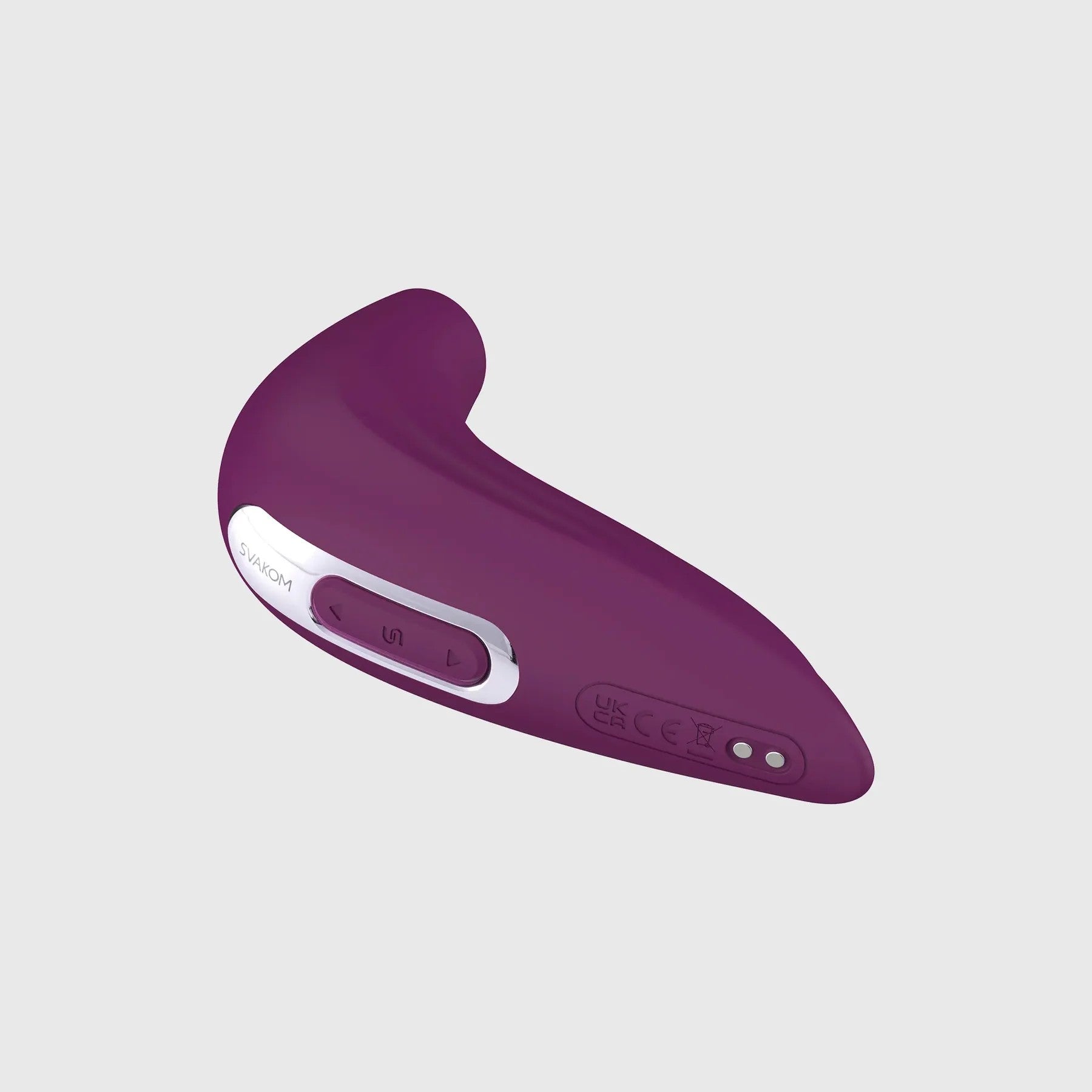 Detailed close-up of the Svakom Pulse Union stimulator showing the control panel, SVAKOM branding, and magnetic charging port on a plain grey background.