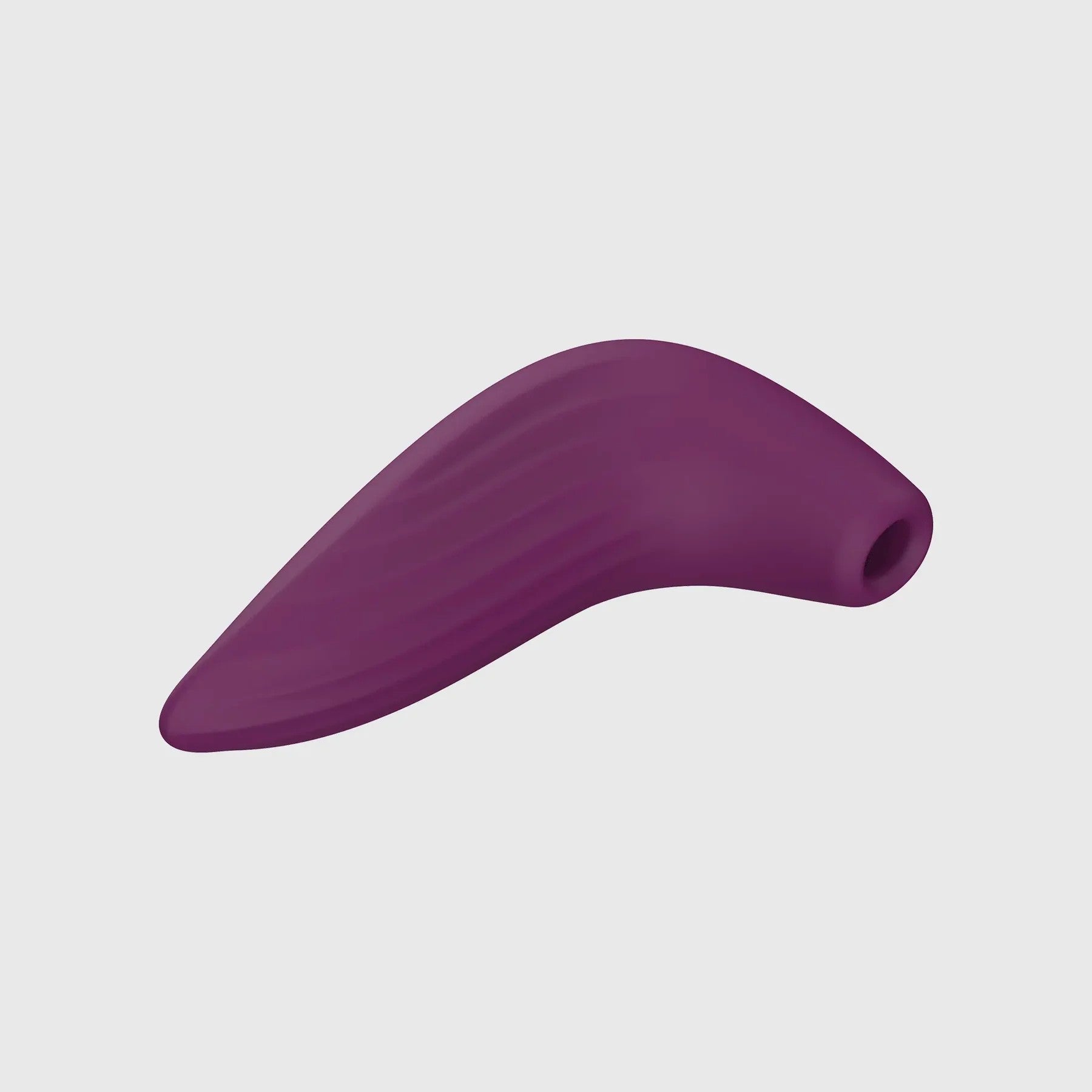 Side view of the Svakom Pulse Union stimulator, highlighting its contoured shape and soft silicone finish.