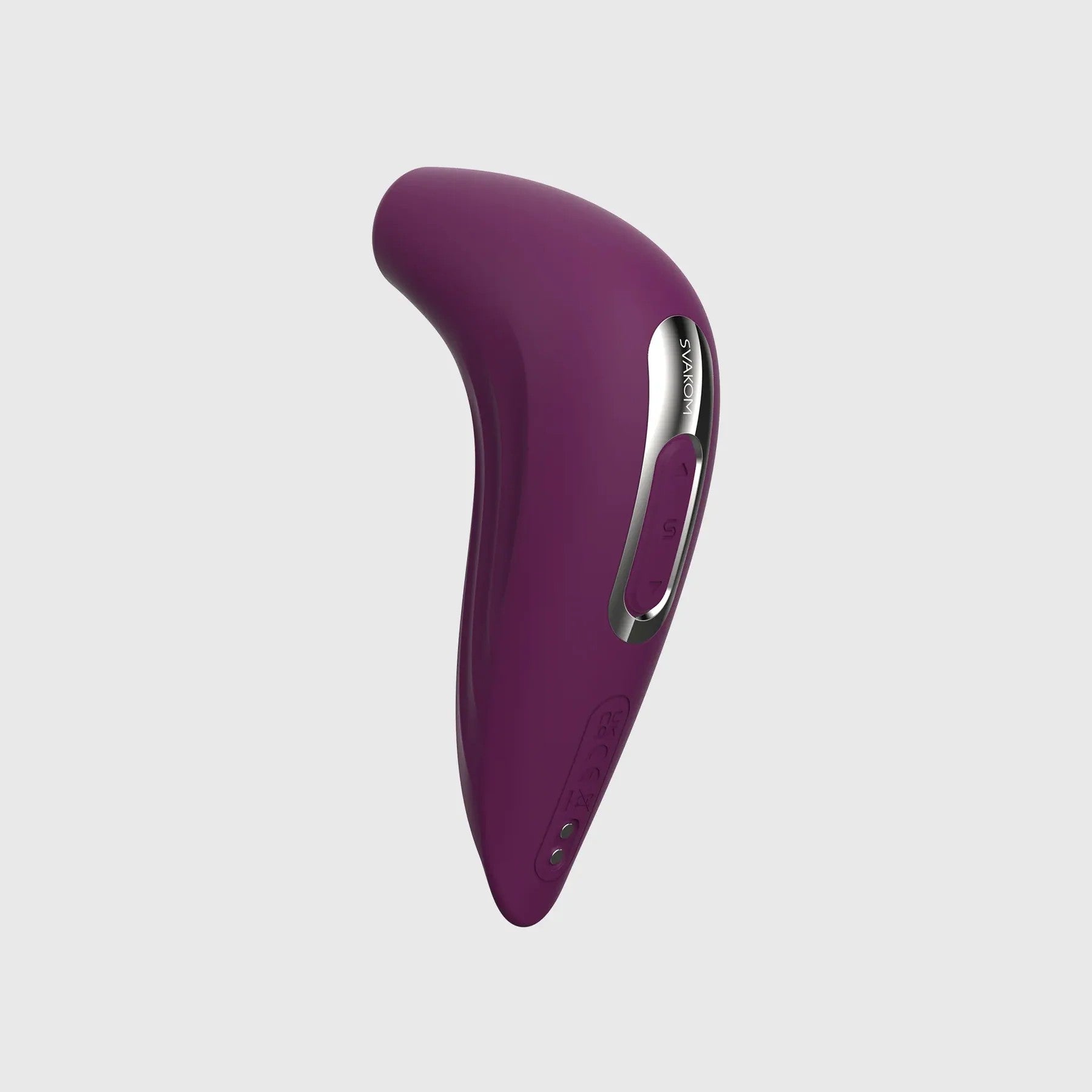 Angled view of the Svakom Pulse Union stimulator highlighting the sleek control panel and charging contacts, set against a neutral grey background.