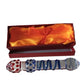 Dual-textured glass dildo with red dots and blue spiral grooves in silk-lined gift box